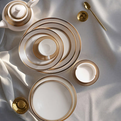 Set di piatti dorati Iupitter