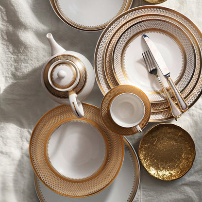 Set di piatti dorati Iupitter